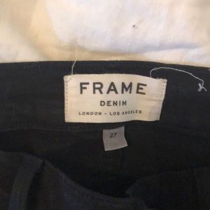 Black ripped frame jeans